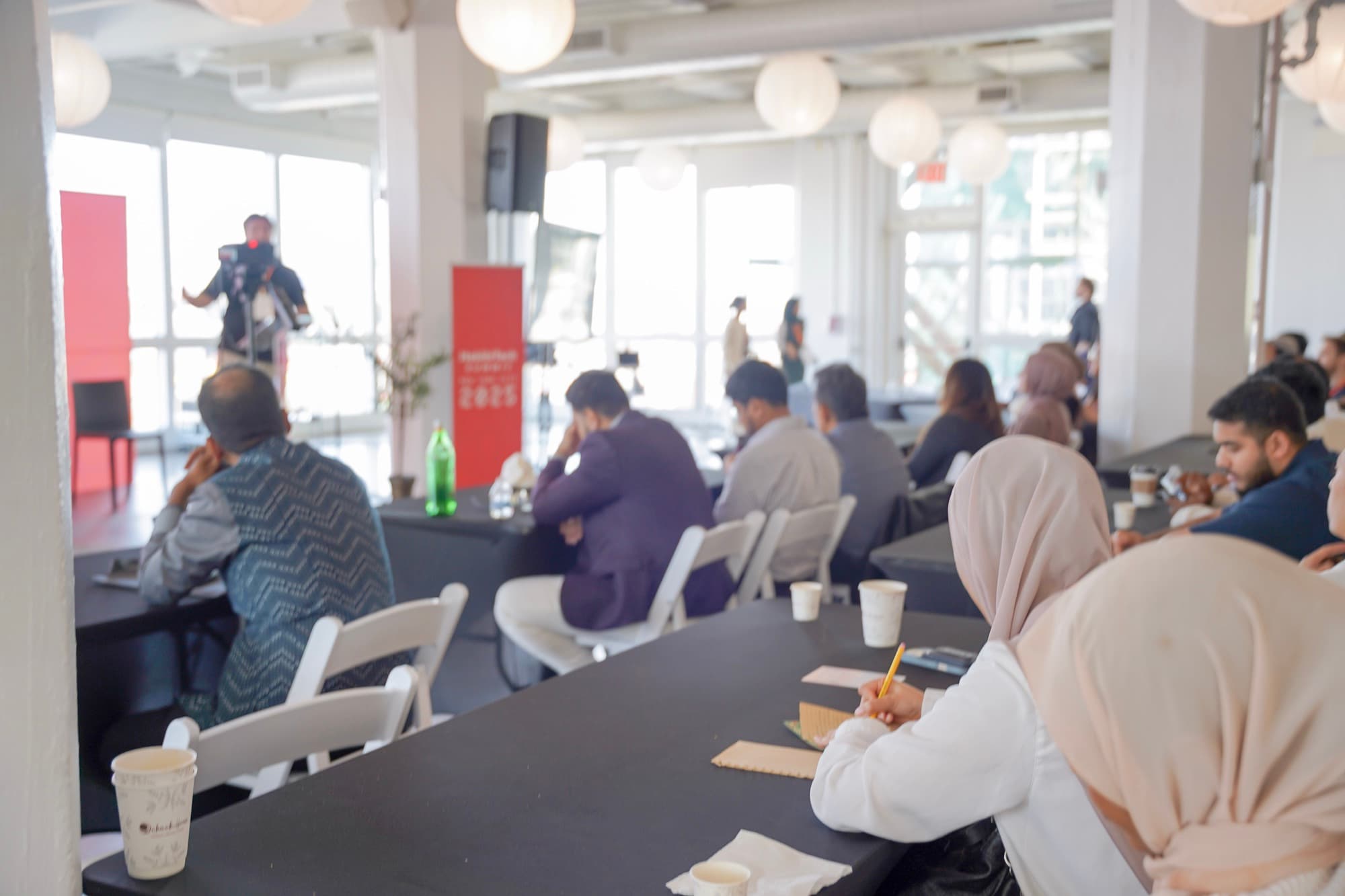 The main room at Habibi Tech Summit during a session.